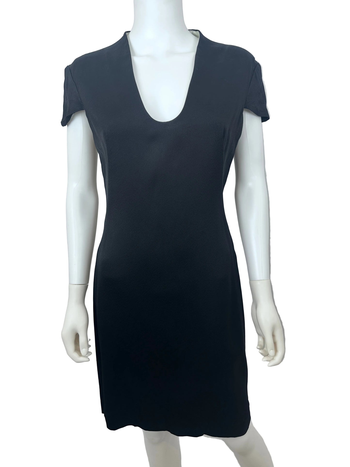 A black short-sleeve bodycon dress displayed on a white mannequin torso against a light gray wall.