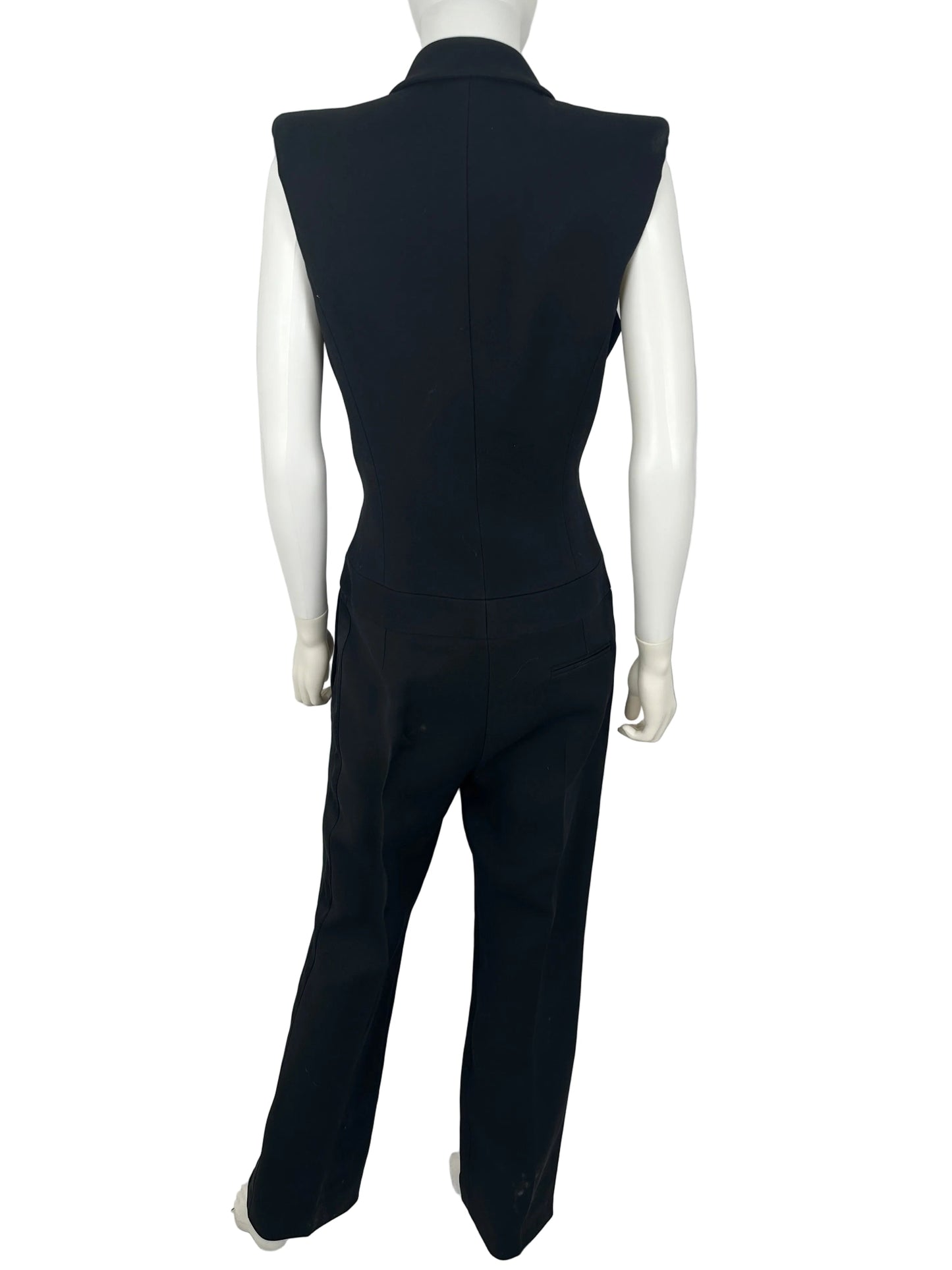 Black jumpsuit on a mannequin against a white background