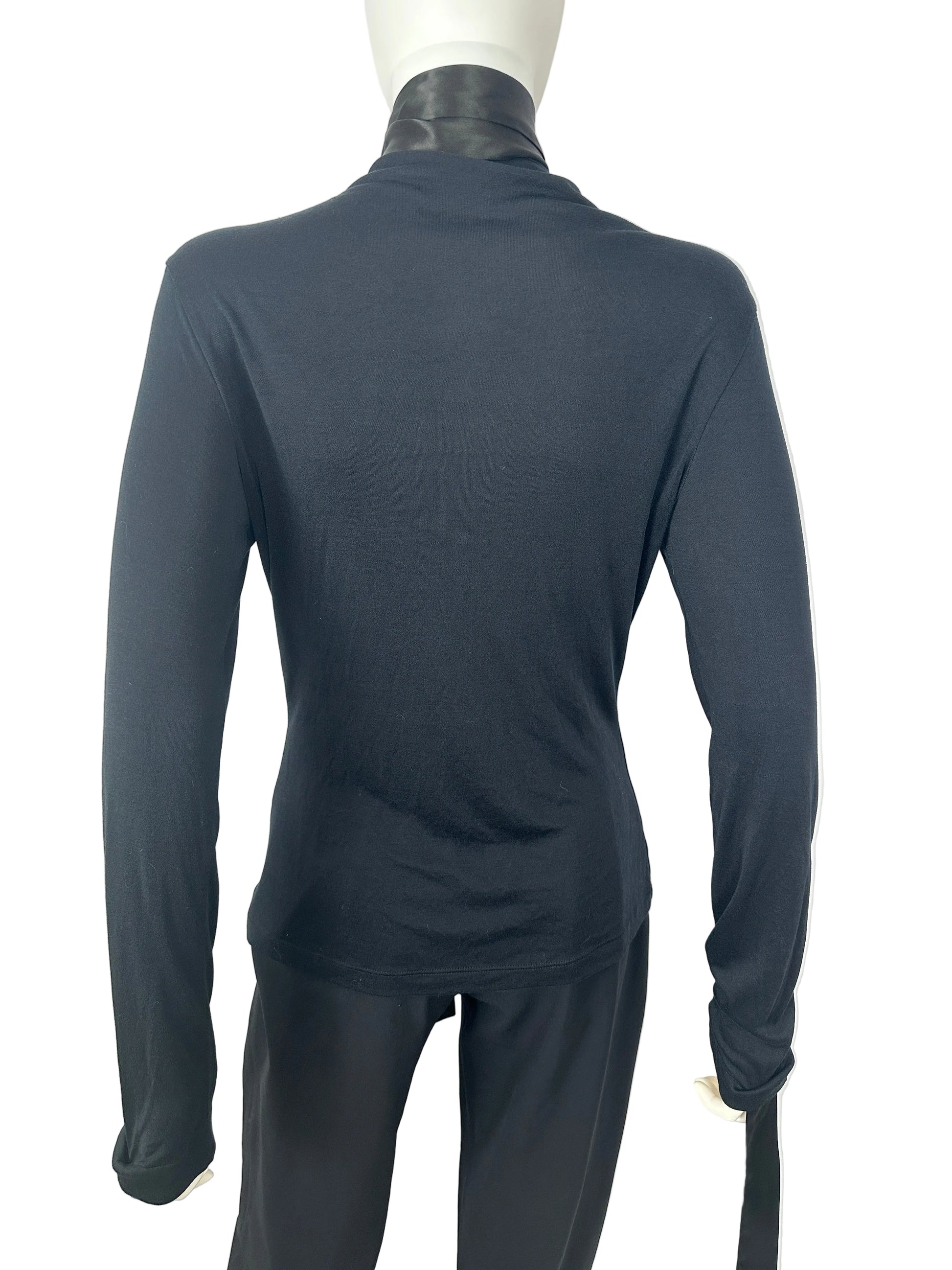 Black long-sleeve shirt and pants on a mannequin against a white background