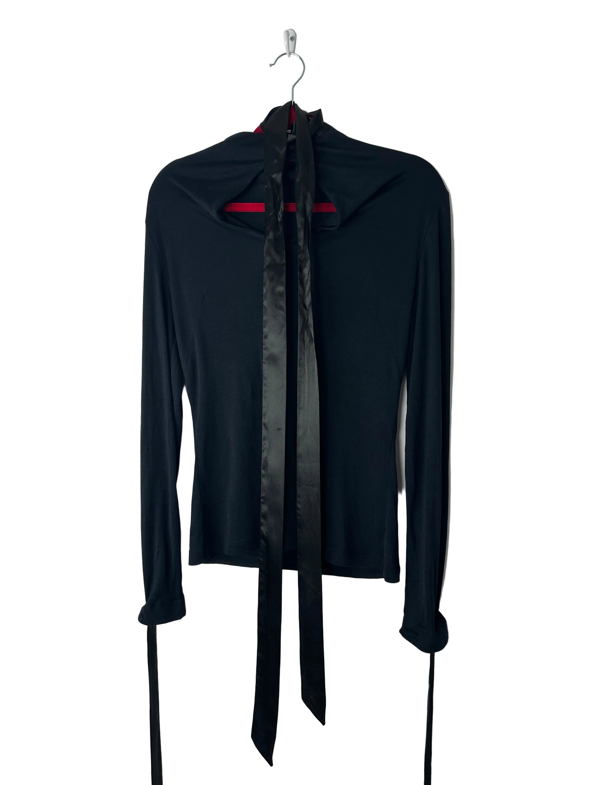 Black jacket with red accents on a white background