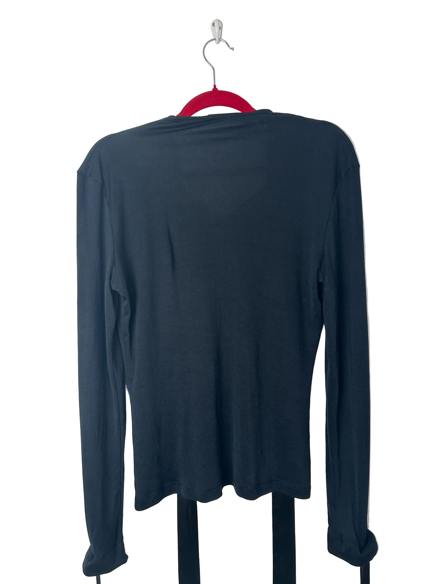 Navy long-sleeve shirt on a hanger against a white background