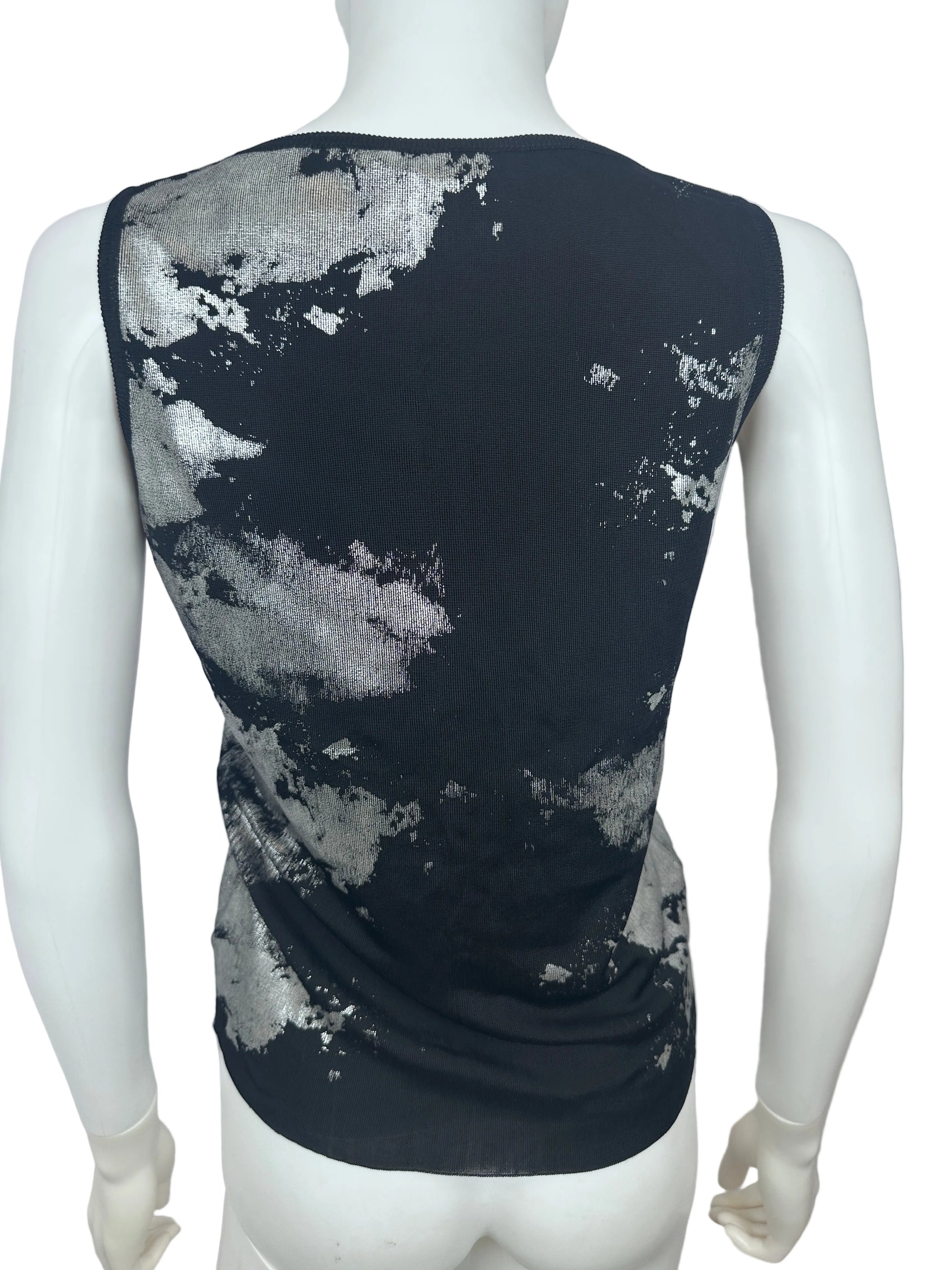 A black knit tube top with a distressed silver metallic foil pattern, displayed on a white mannequin torso.