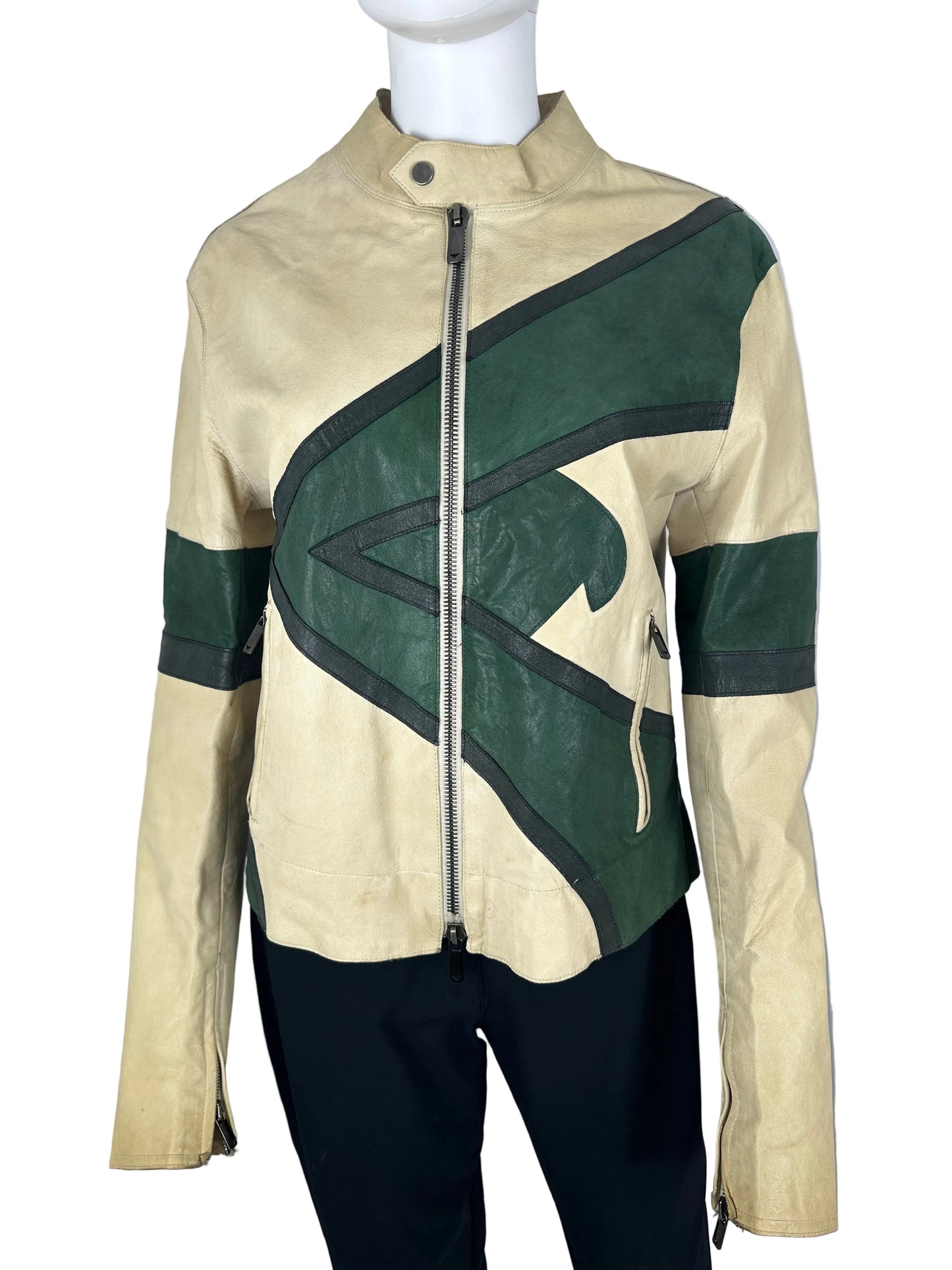 Beige and green jacket with a large 'V' logo on a mannequin against a gray background