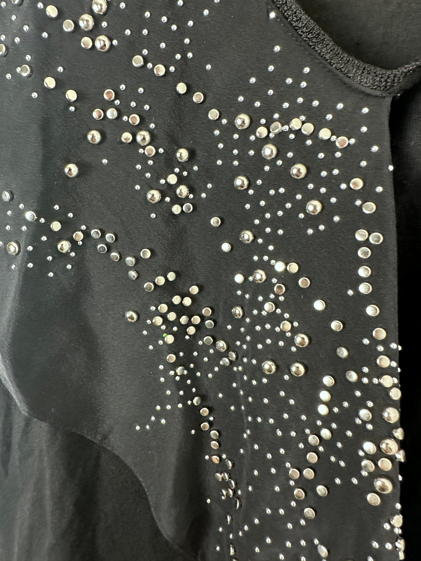 Black fabric with scattered silver rhinestones