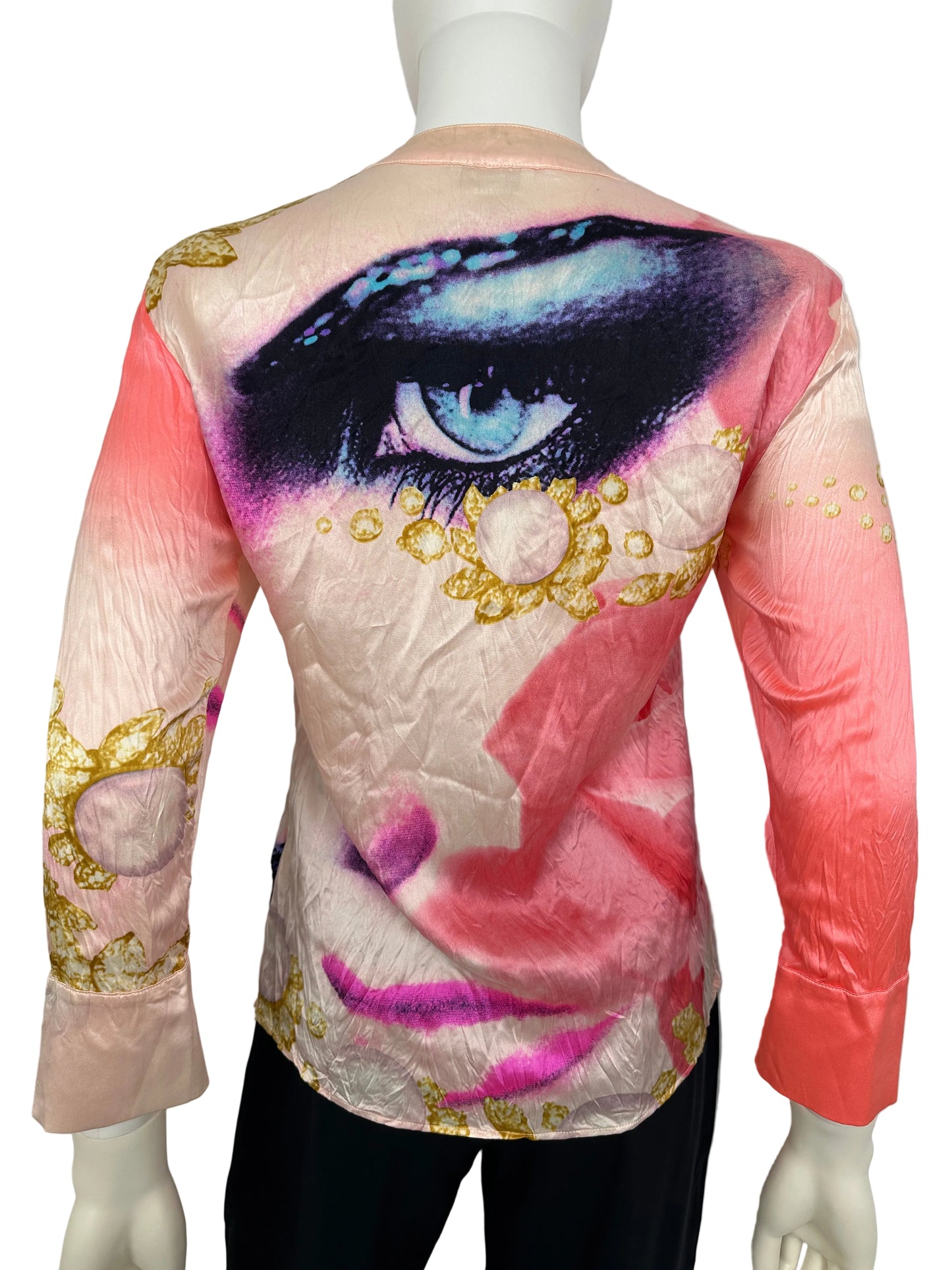 Colorful artistic garment on a mannequin with abstract design