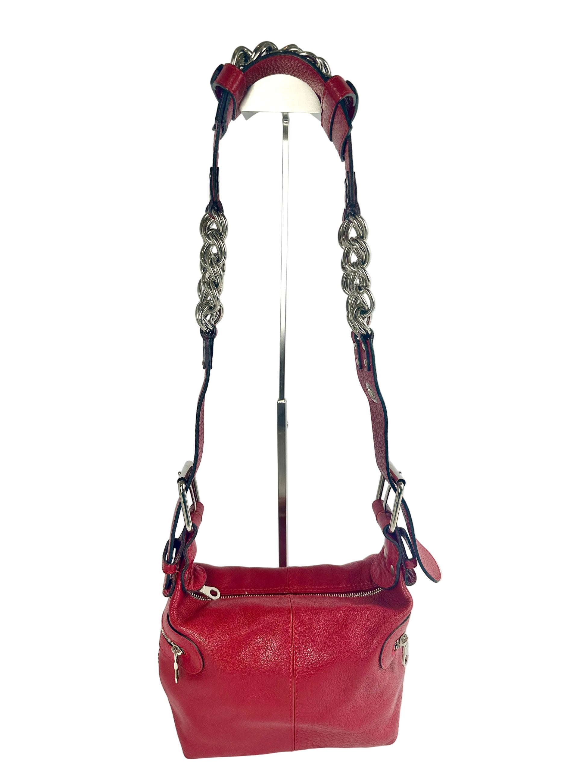 Red handbag with a large chain strap
