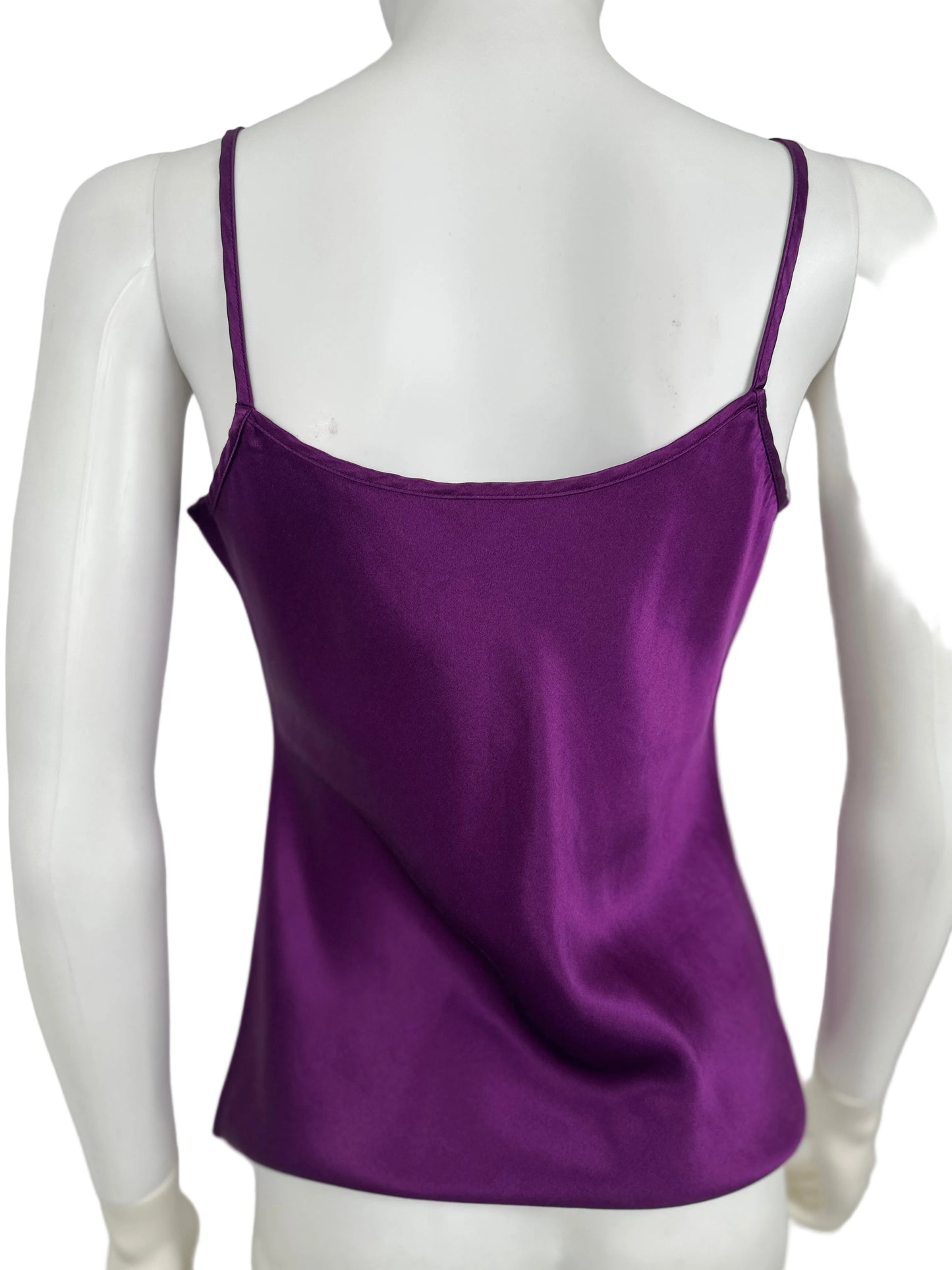 Purple satin camisole on a mannequin against a gray background