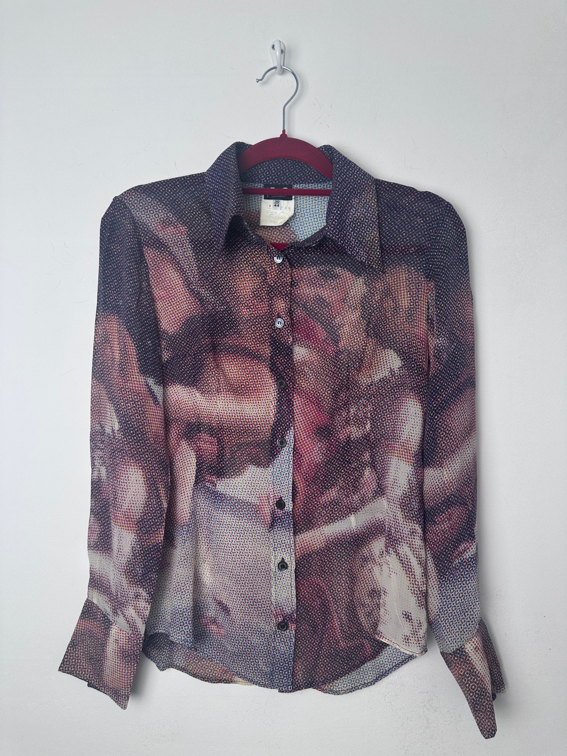 Birth of venus print shirt on a red hanger
