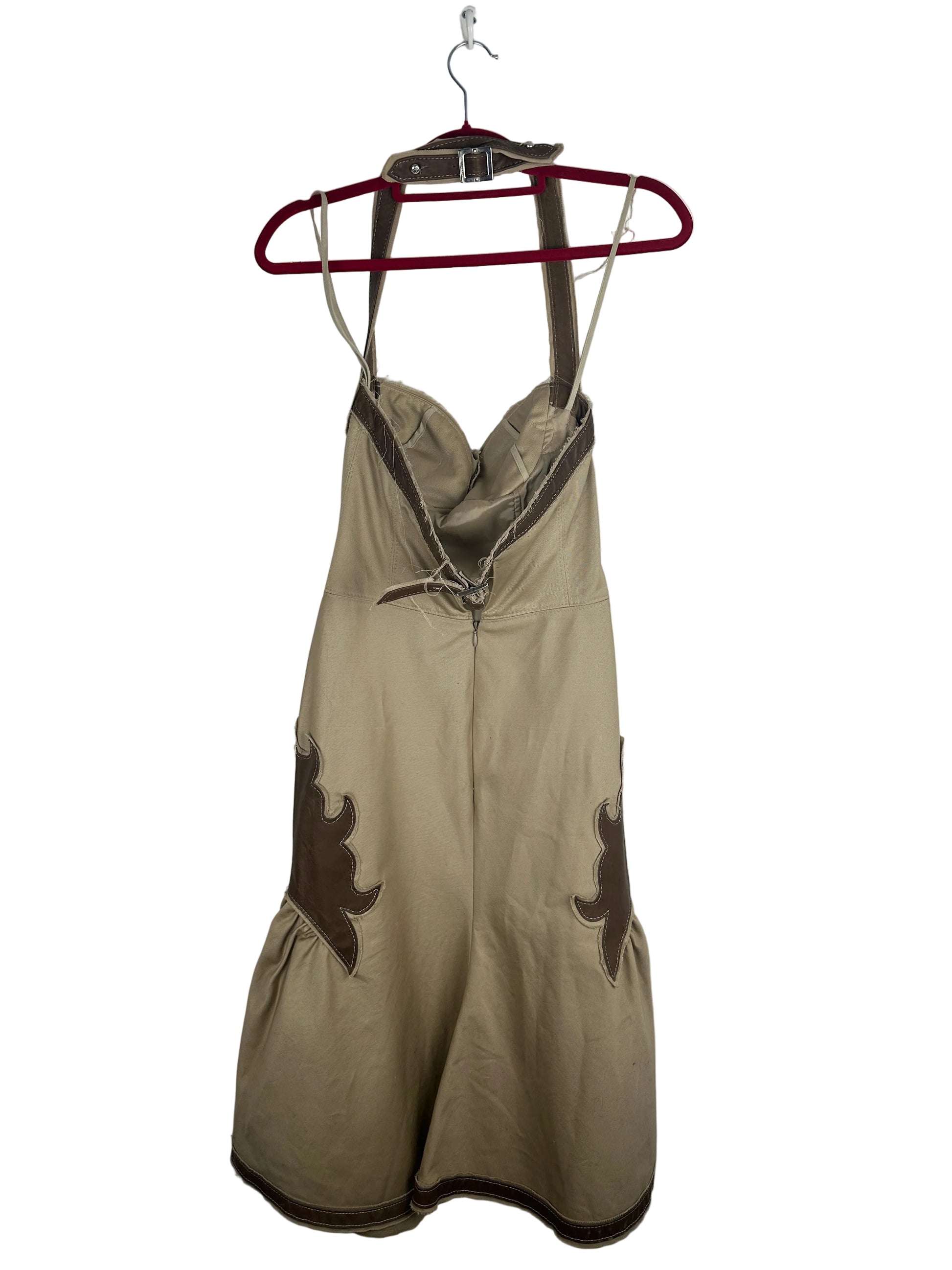 Beige dress with brown accents on a white background