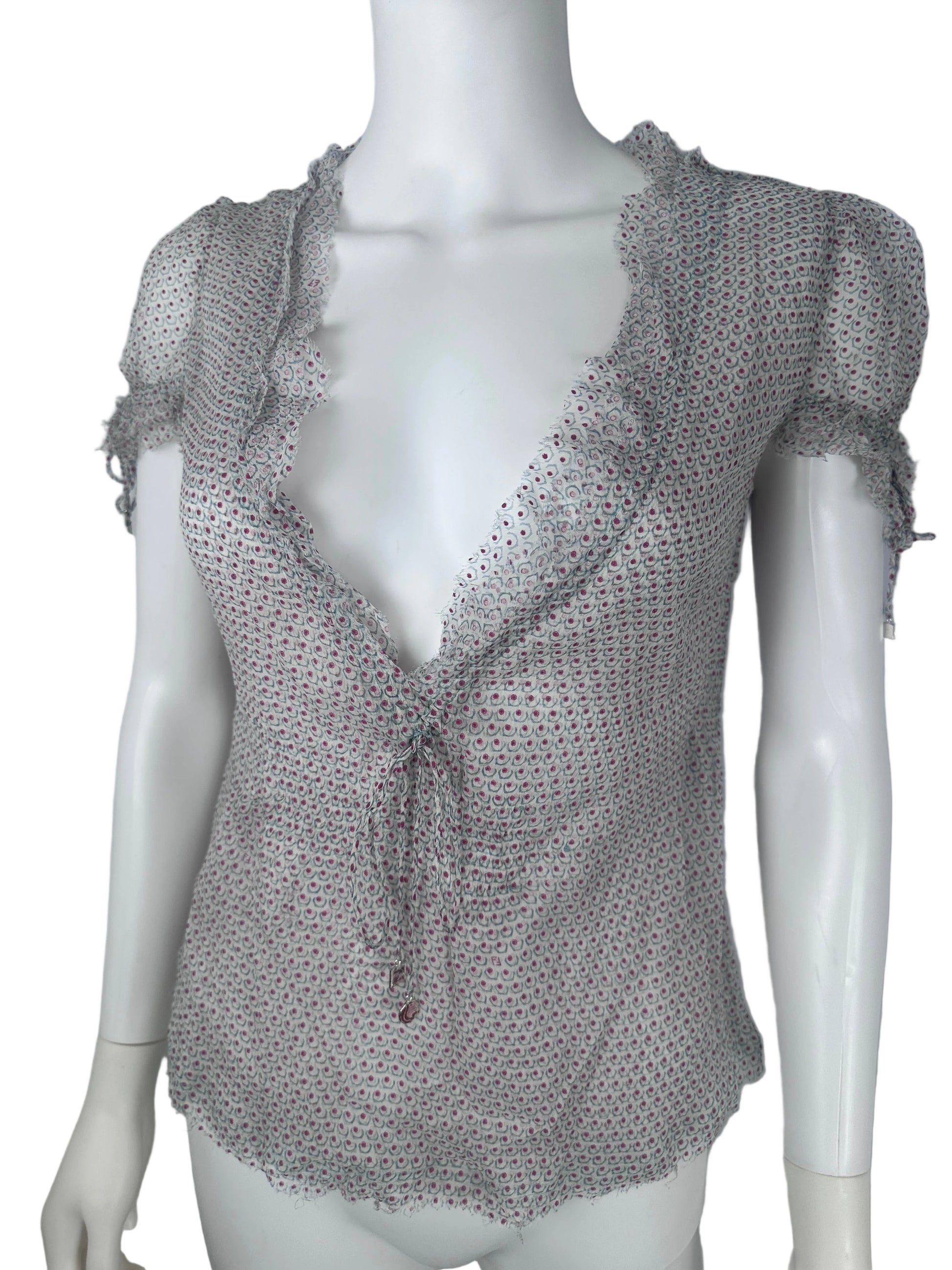 SIlk shirt on. awhite mannequin