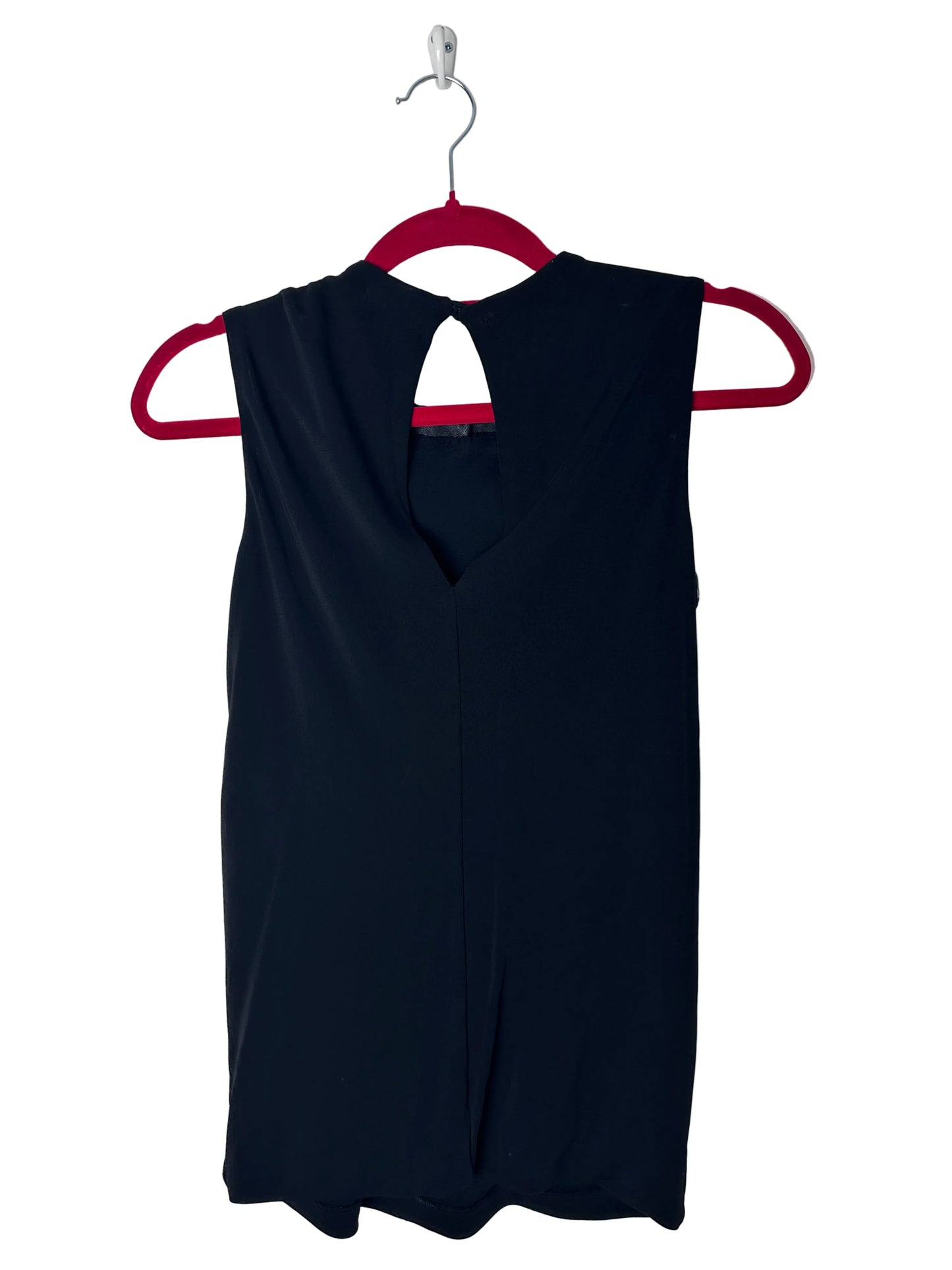 Black top on a red hanger against a white background