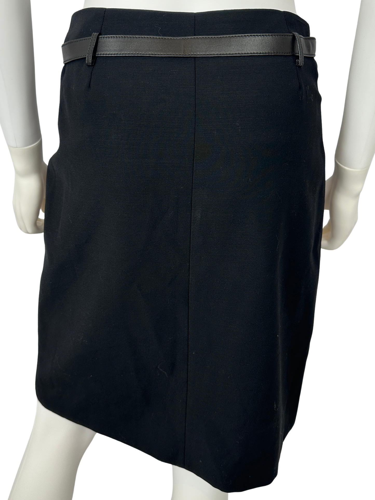 Black skirt on a white mannequin with leather belt