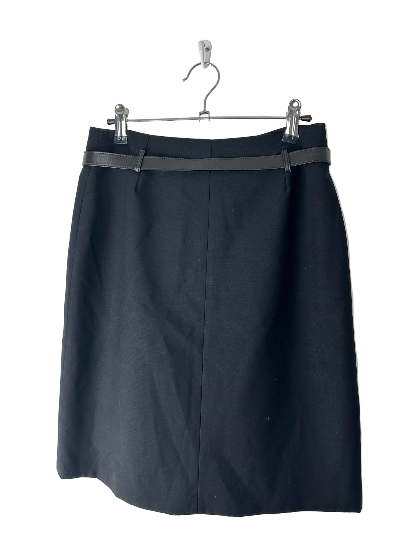 Black skirt with a silver zipper on a white background