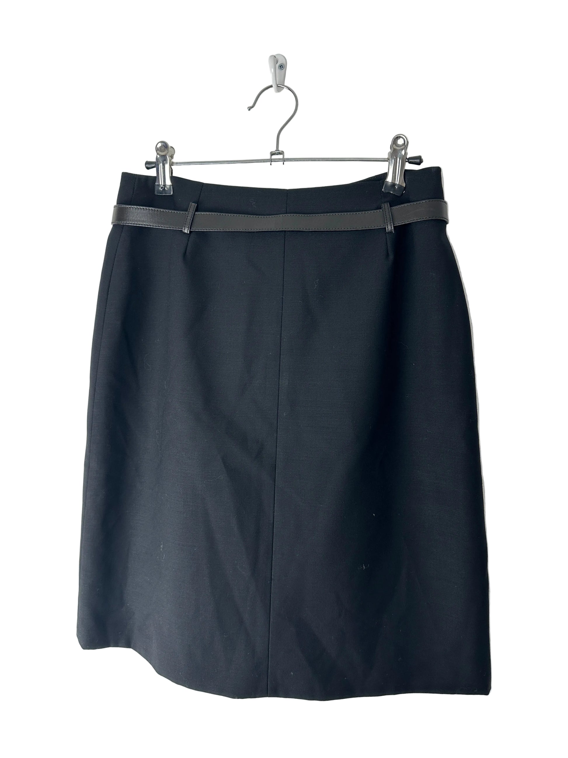 Black skirt with a silver zipper on a white background