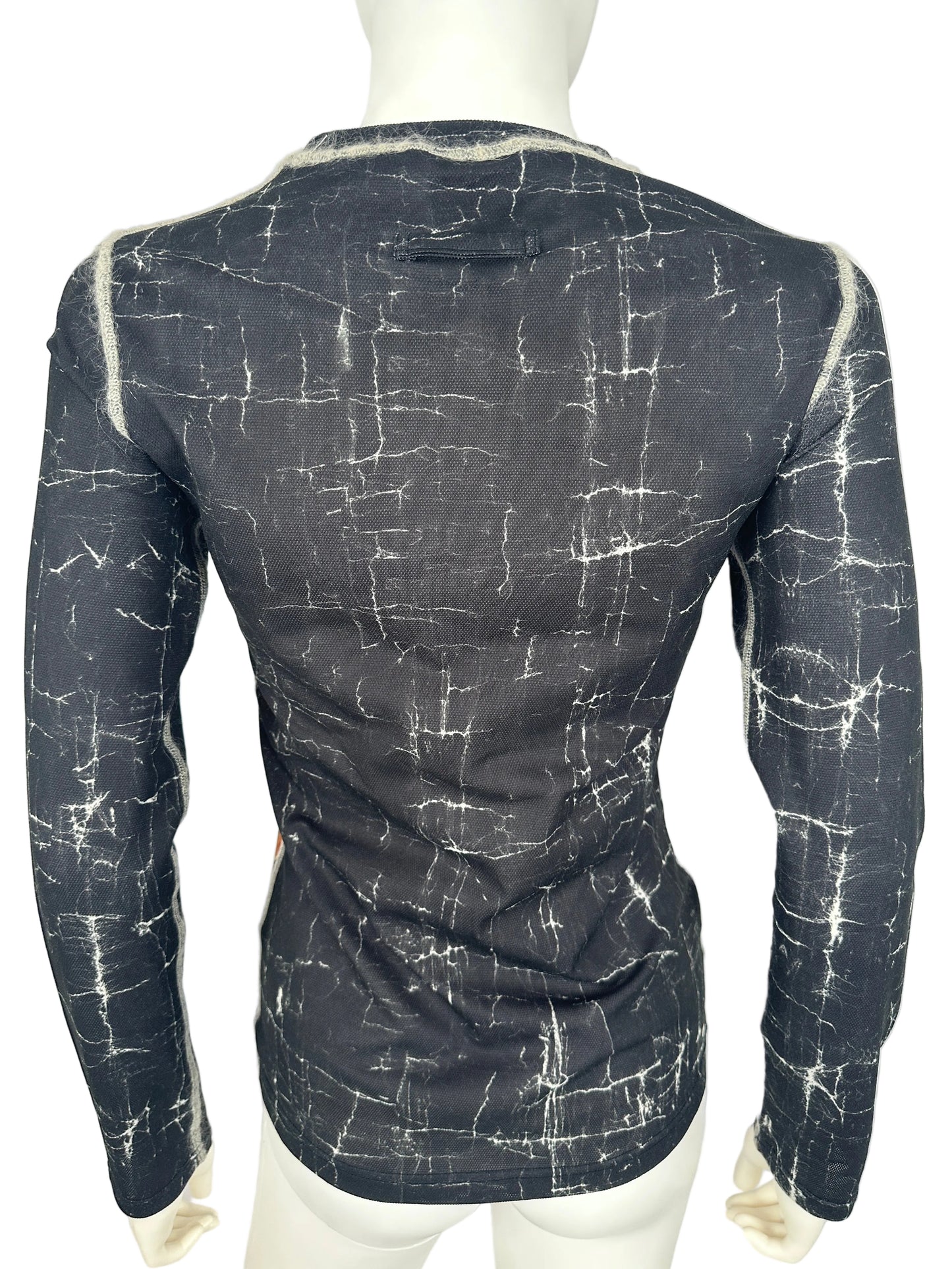 Black textured top on a white background