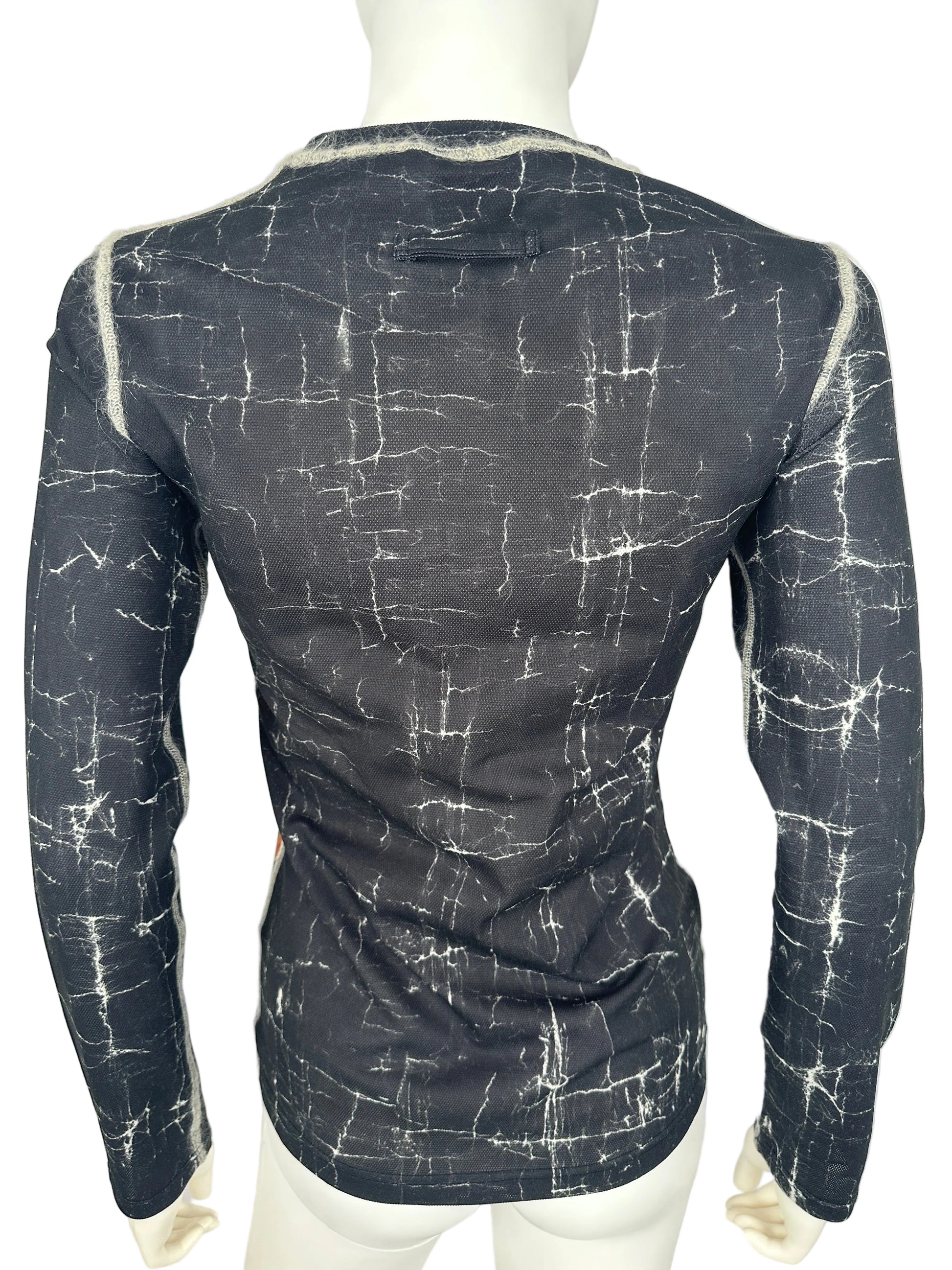 Black textured top on a white background