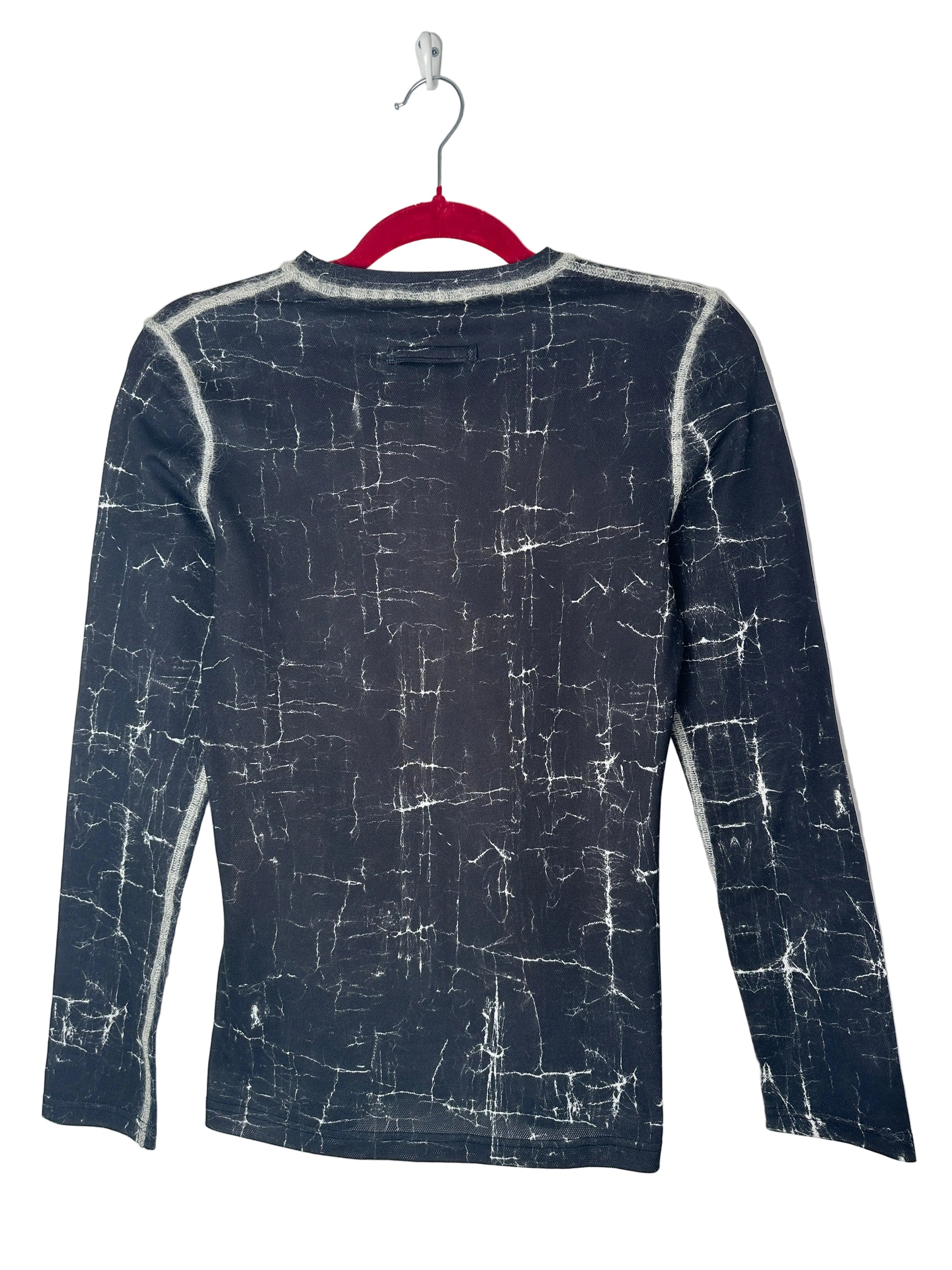 Dark blue patterned fabric on a white background