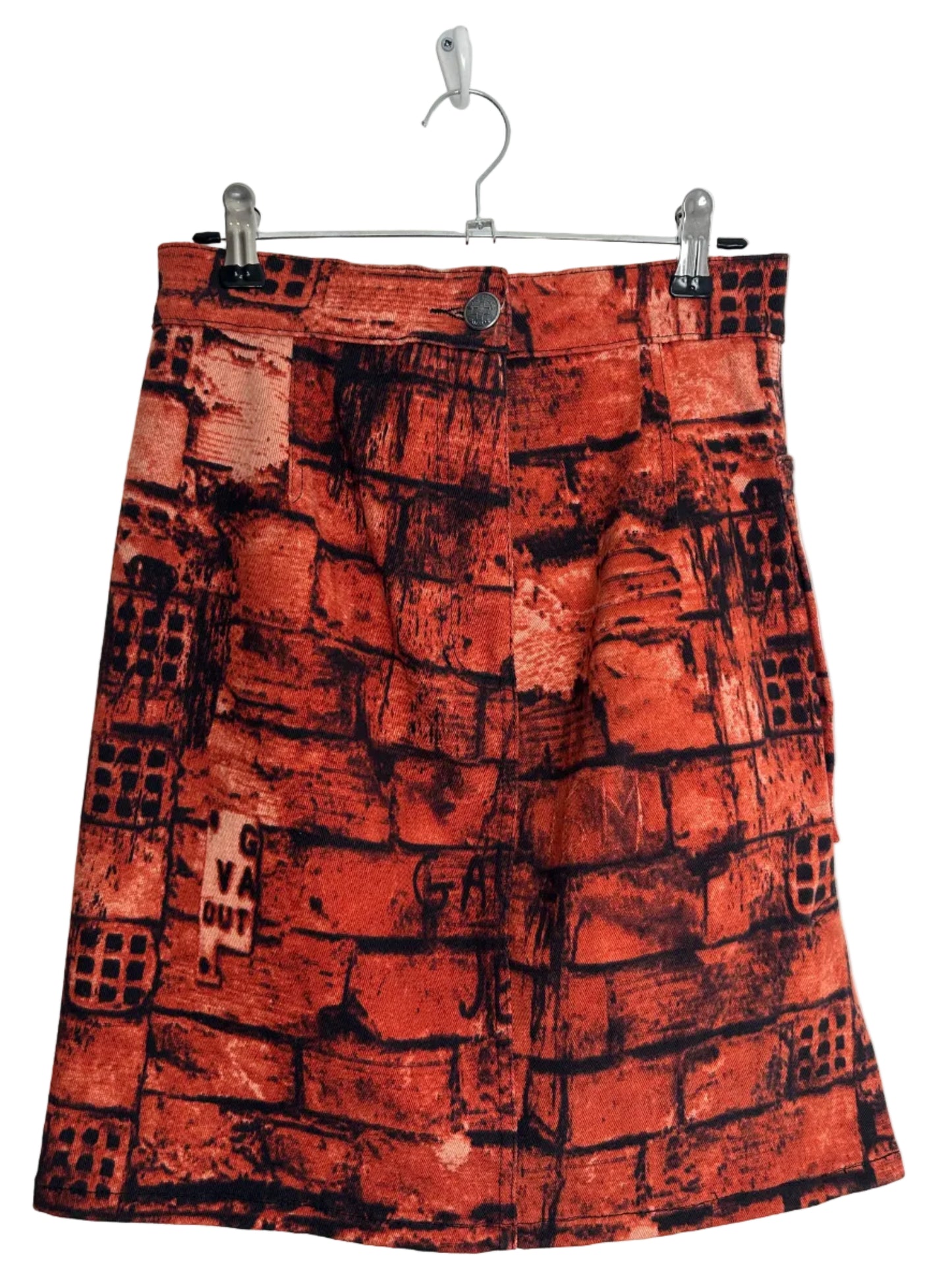 Skirt with a pattern on a hanger against a white background