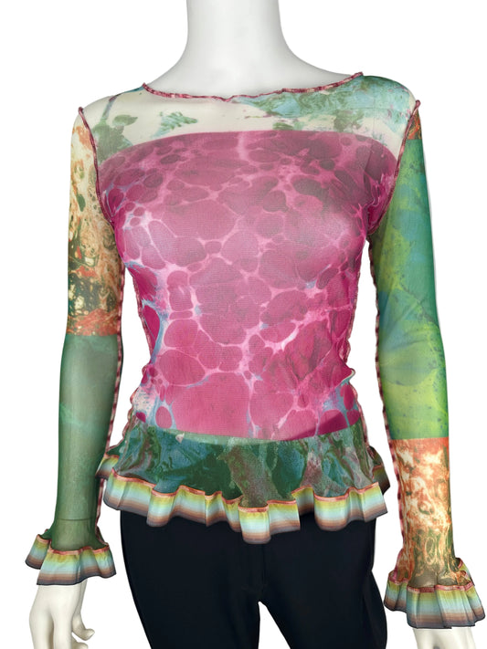 Colorful top on a mannequin with a patterned design