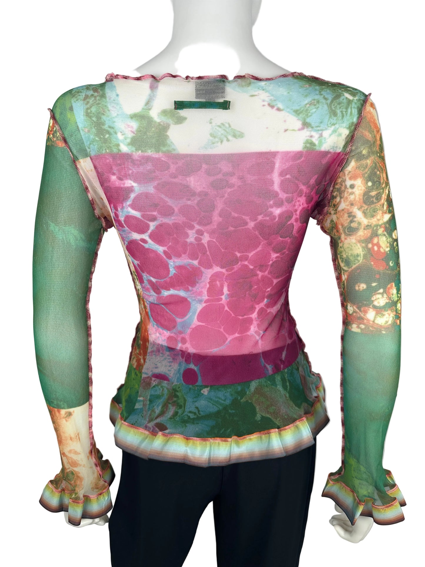 Colorful, abstract top on a gray background