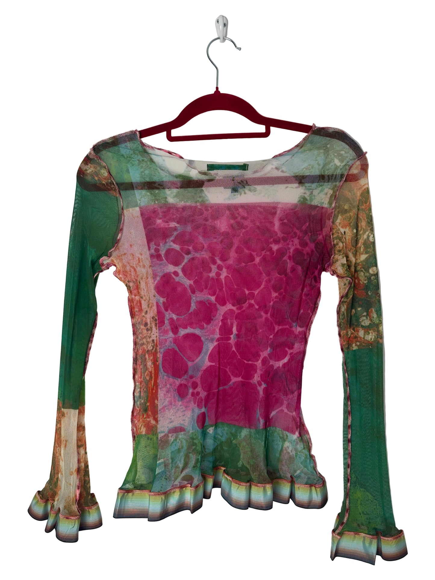 Colorful top with a pattern on a white background
