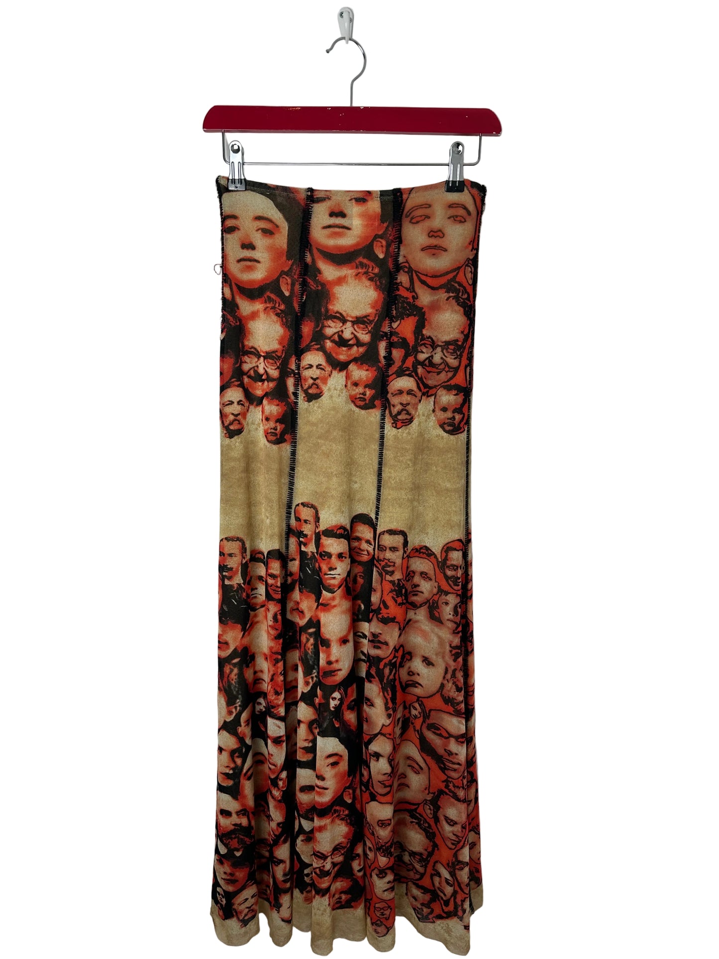 Long Skirt with a pattern of faces on a white background