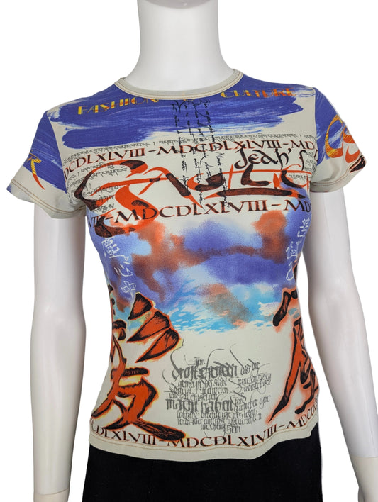 Colorful graphic t-shirt on a mannequin against a gray background