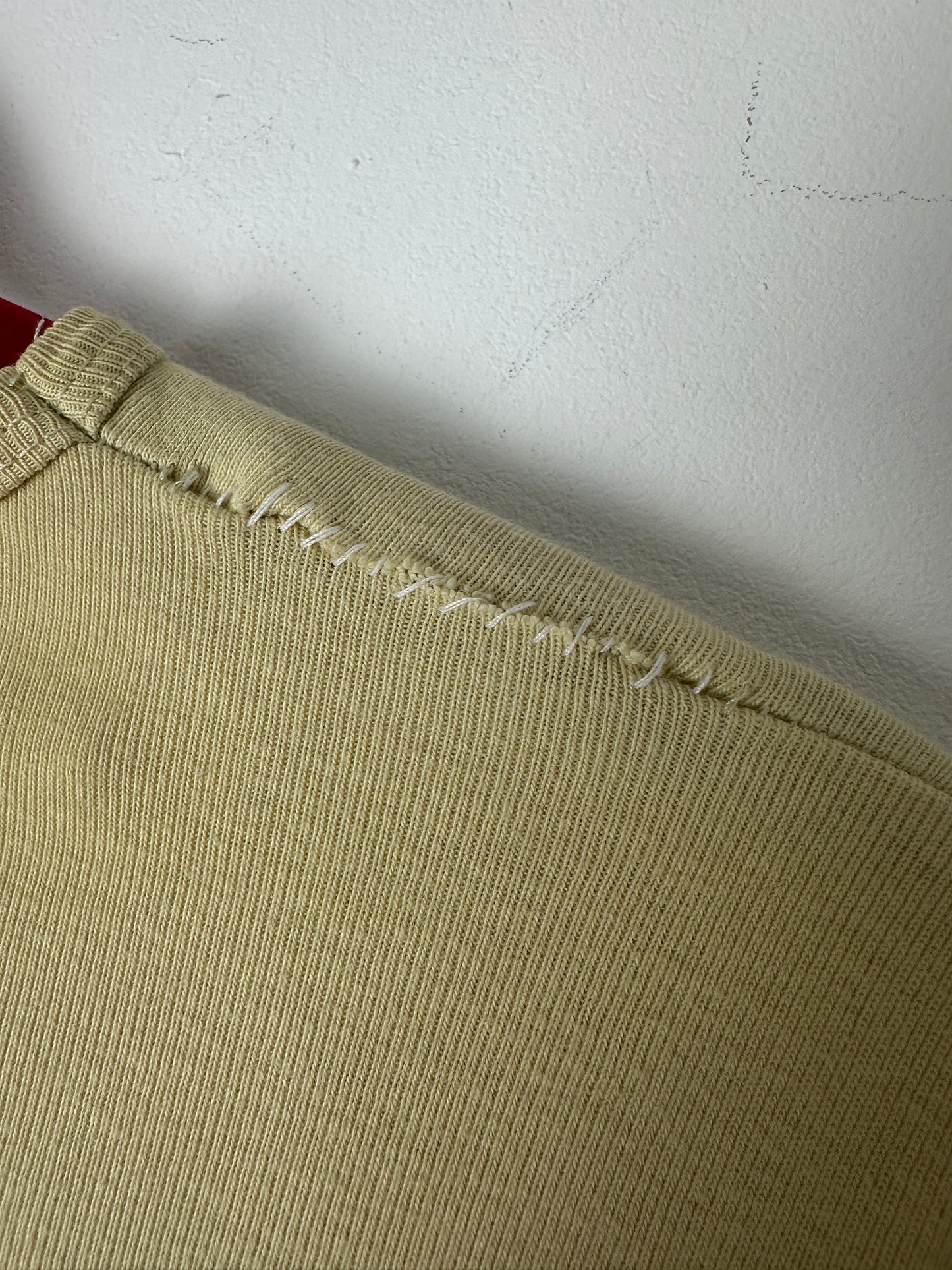 Close-up of a textured fabric corner on a white background