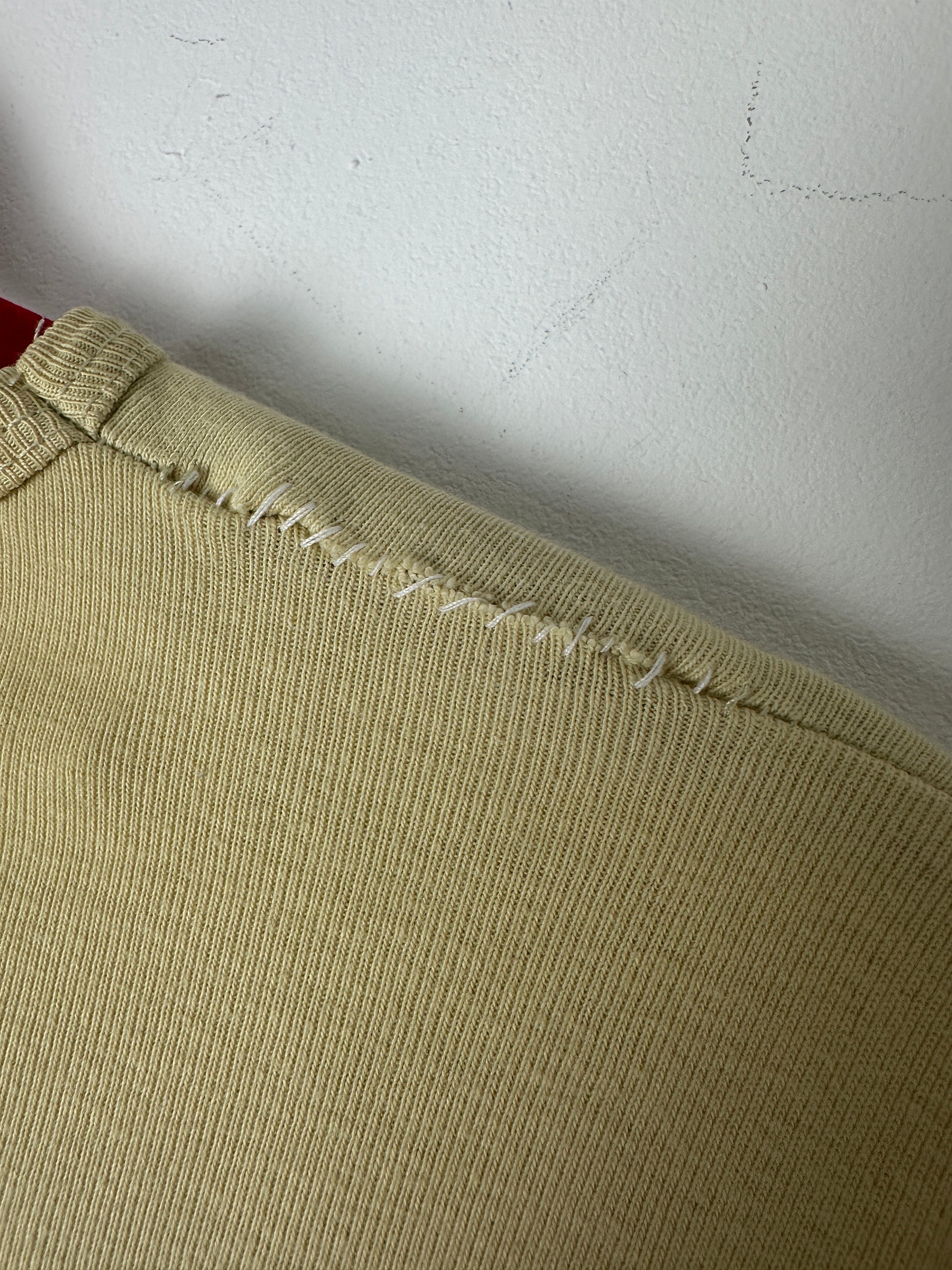Close-up of a textured fabric corner on a white background
