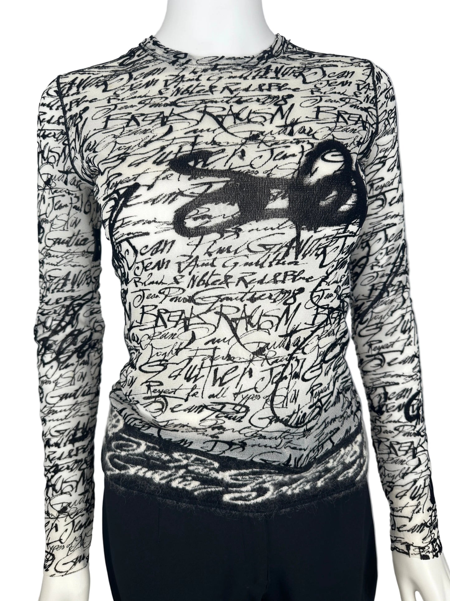 Black and white patterned fabric on a gray background