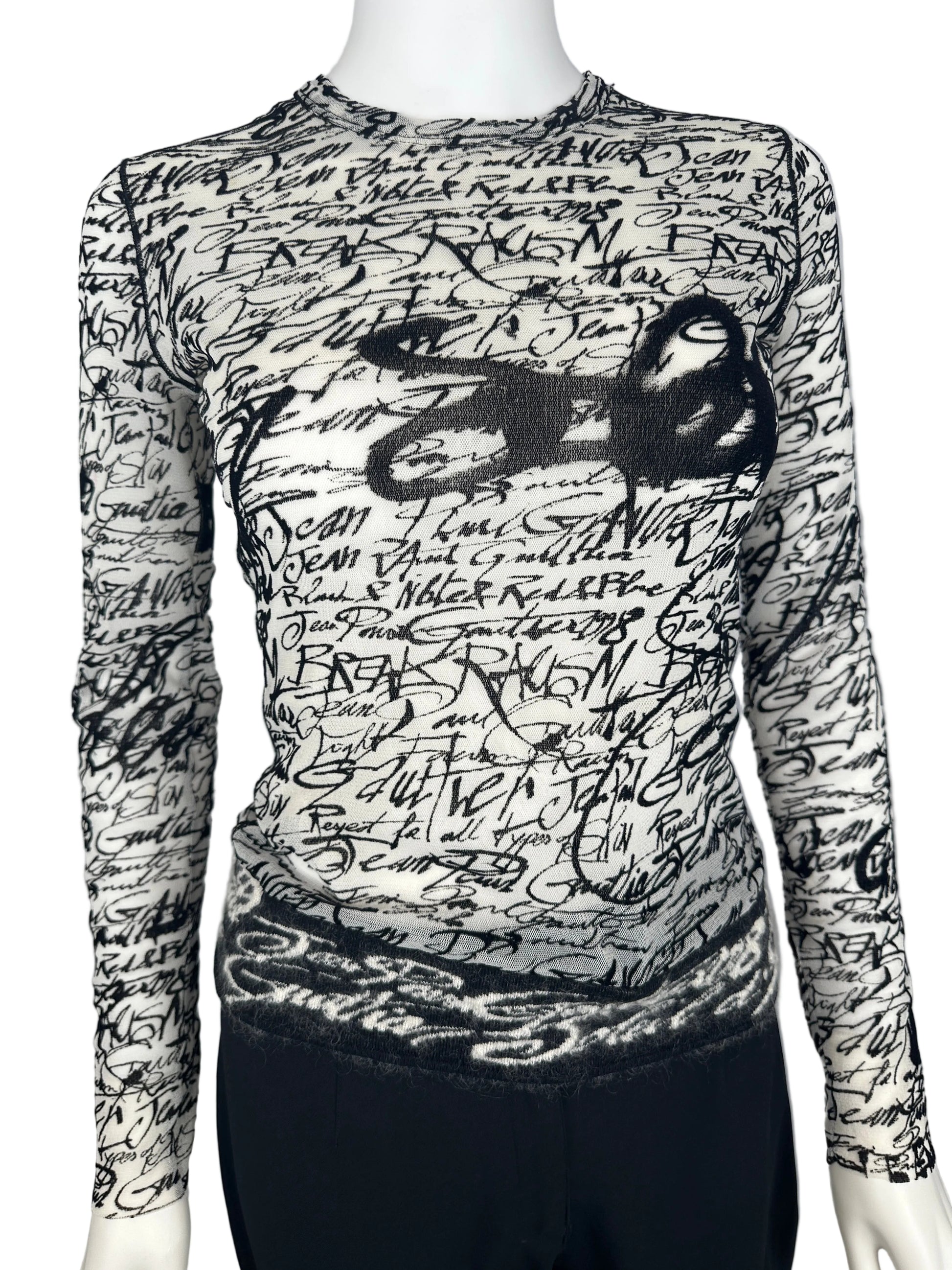 Black and white patterned fabric on a gray background