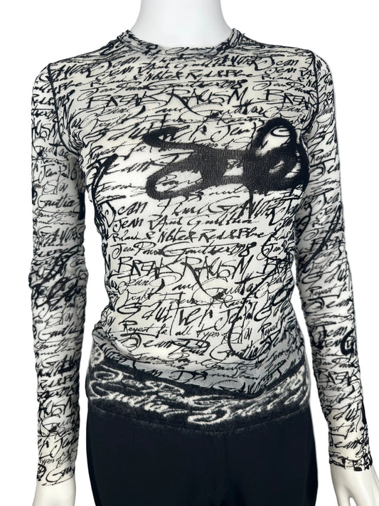 Black and white patterned fabric on a gray background