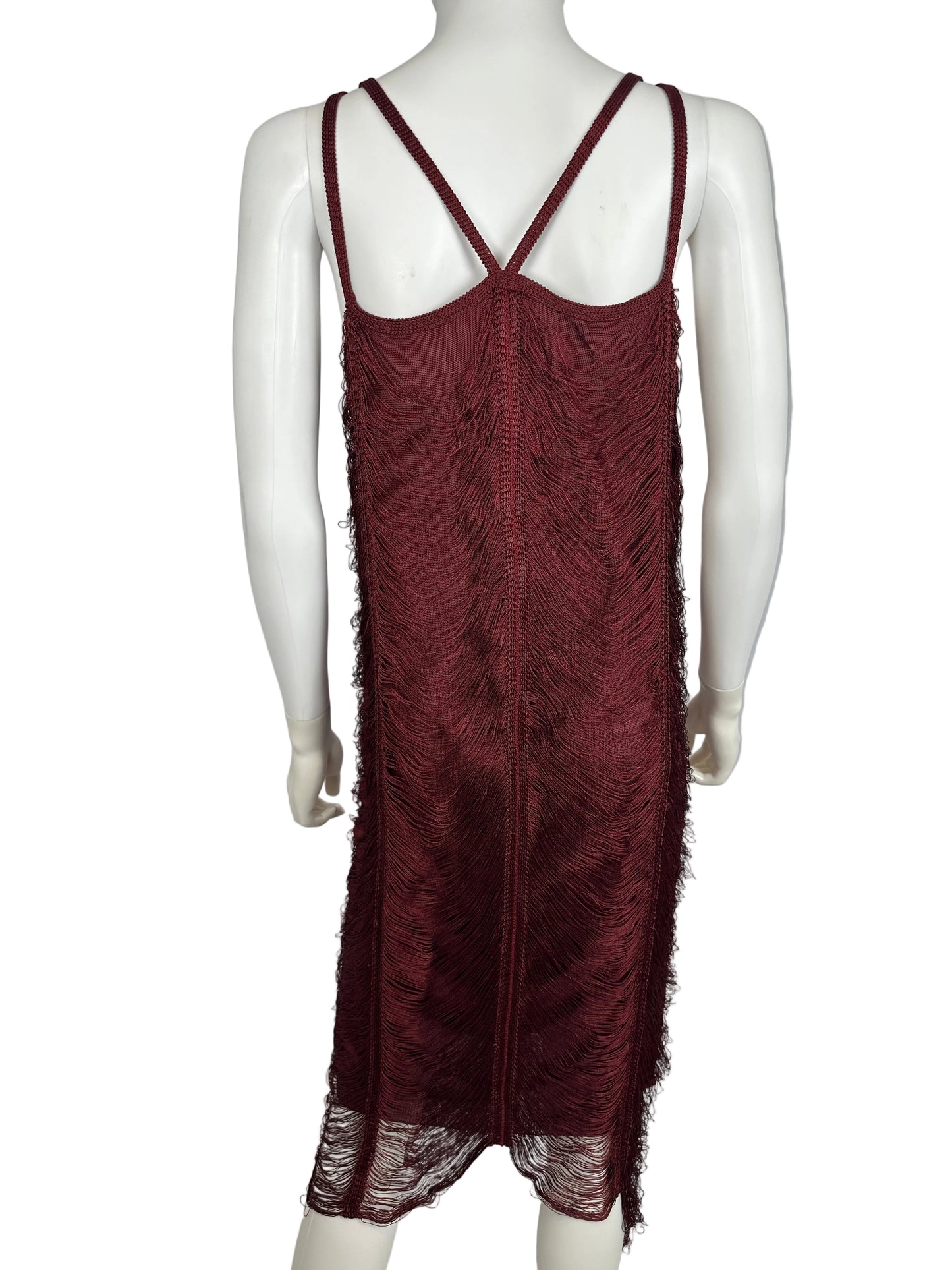 Maroon dress on a white mannequin against a gray background