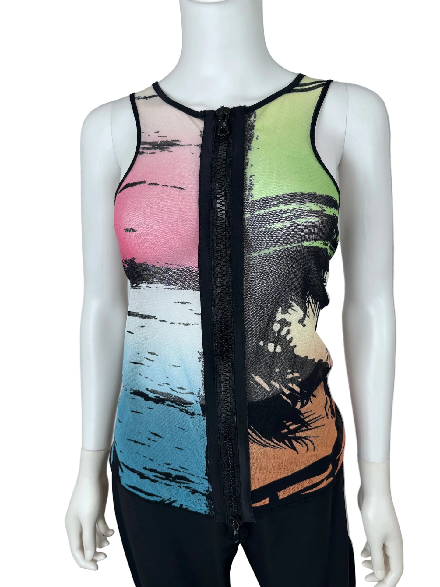 A sleeveless tank top with a colorful abstract print, featuring a prominent black zipper across the chest, displayed on a white mannequin torso.