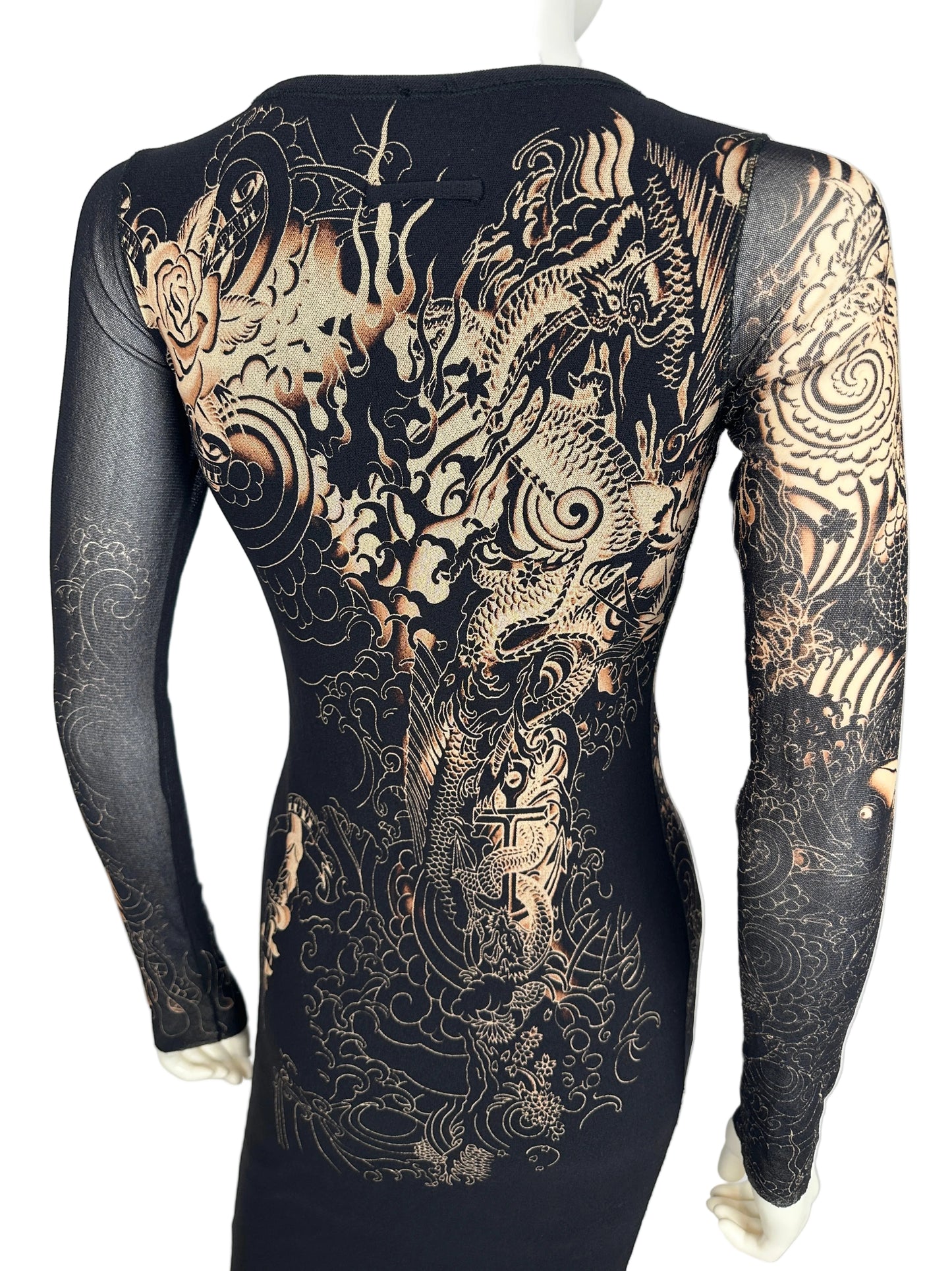 Black glove with gold dragon design on a white background