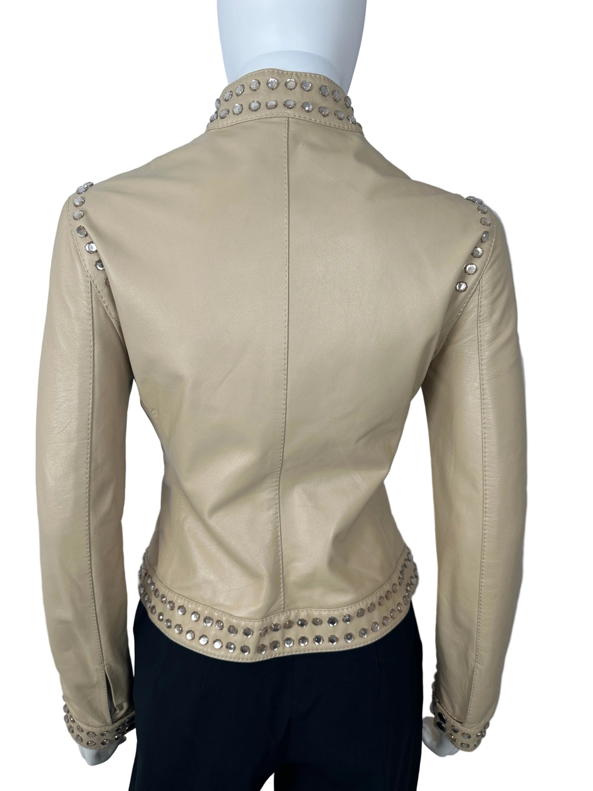 Beige leather jacket with studded details on a white background