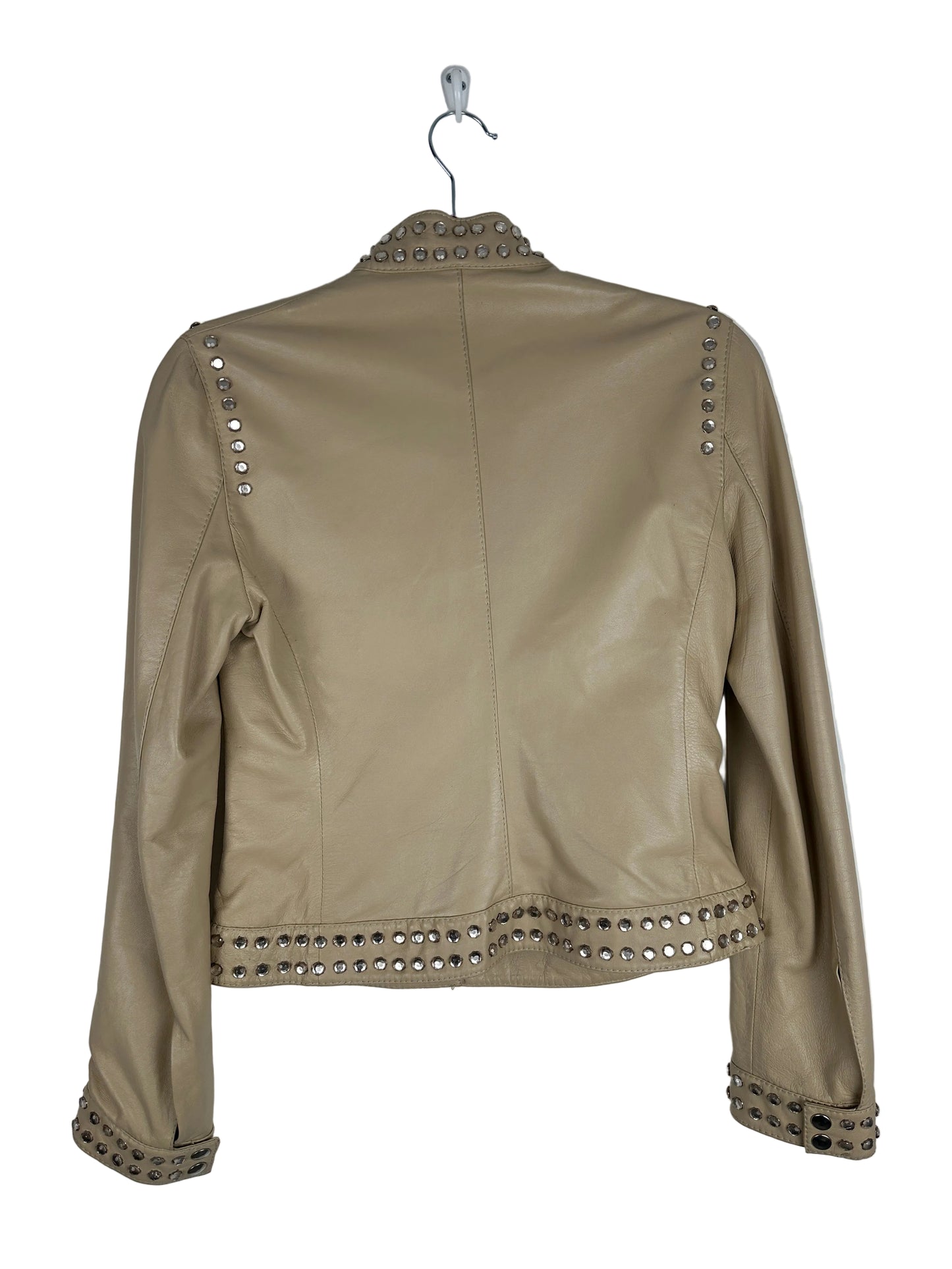 Beige leather jacket with studded details on a white background