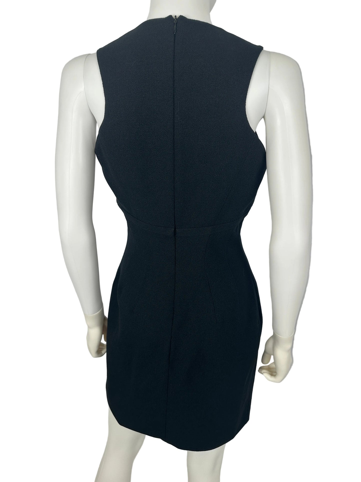 Black dress on a white mannequin against a gray background