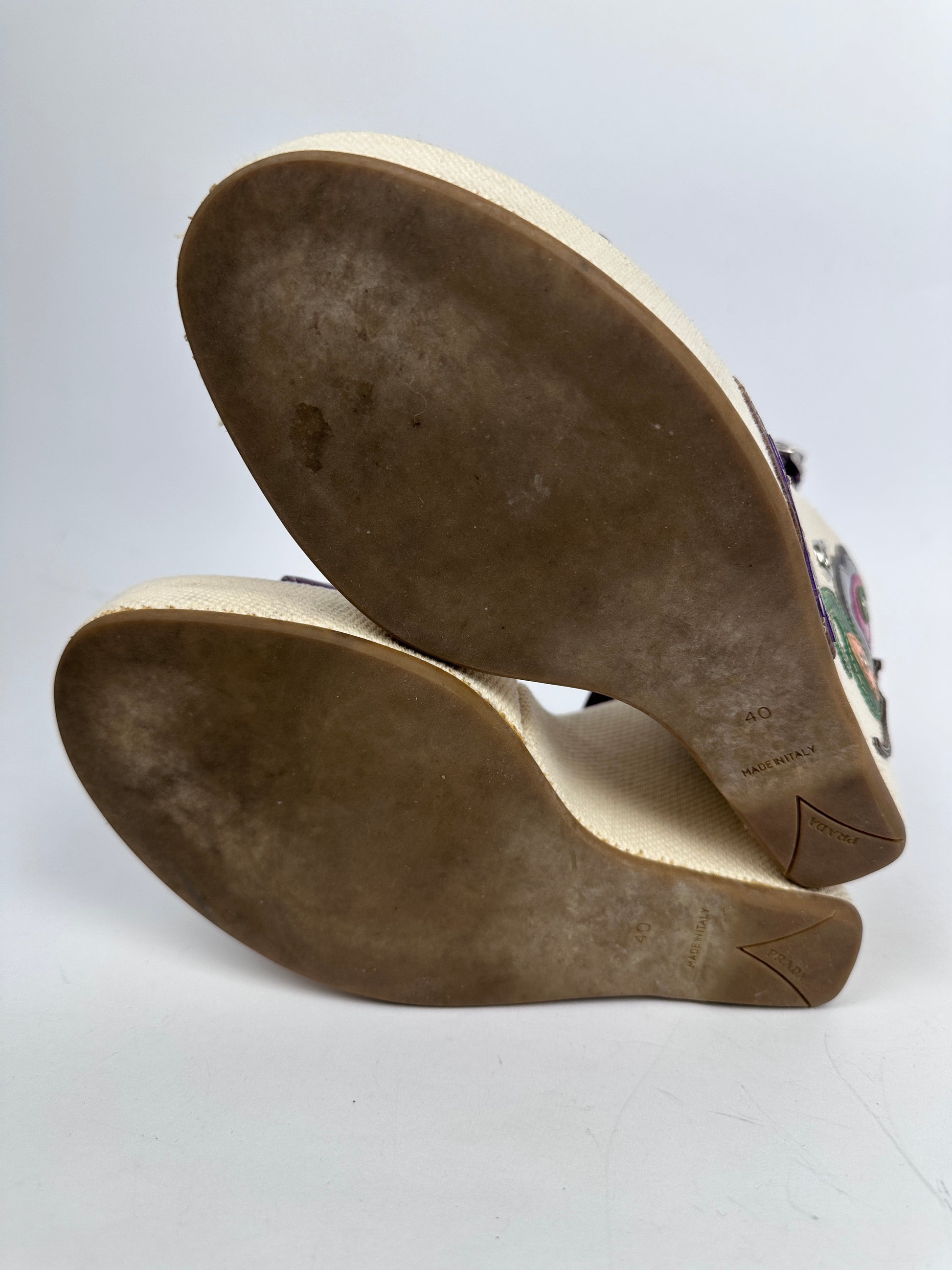 Close-up of brown shoe soles on a white background