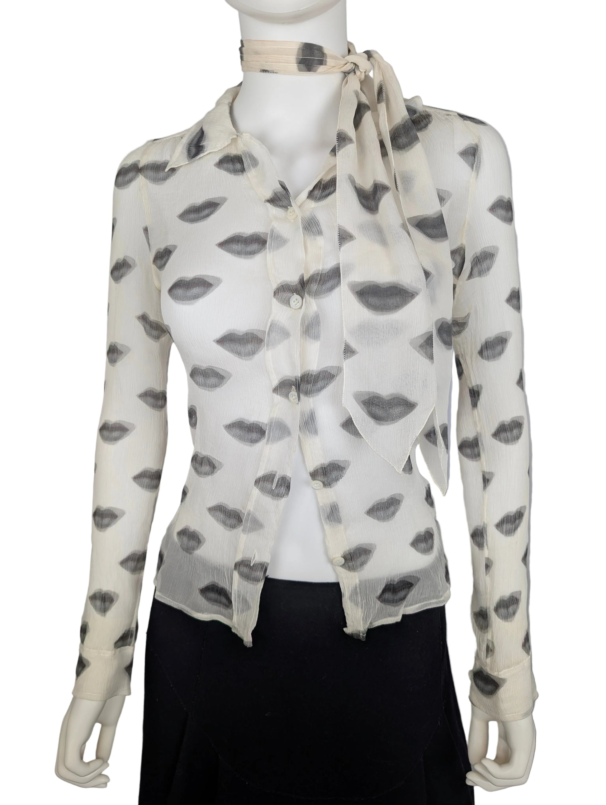 Silk Shirt with black and white lips print on a white mannequin