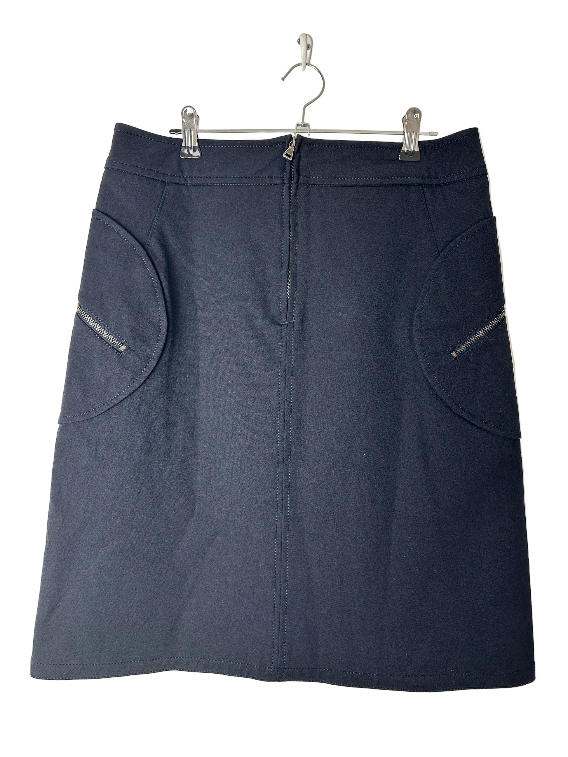 Black skirt on a beige background