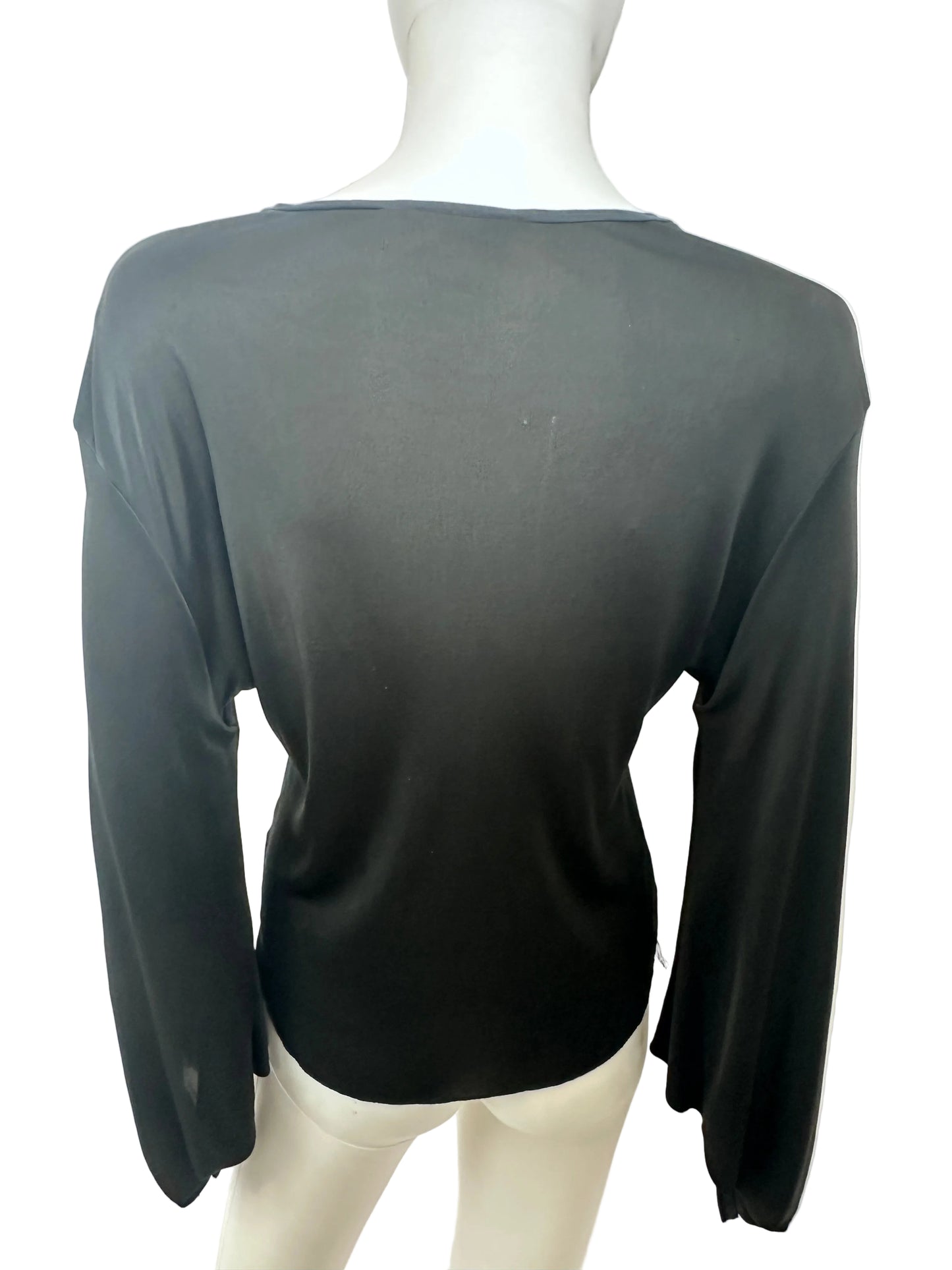 A black long-sleeve knit top displayed on a white mannequin torso, photographed from above against a plain white background.