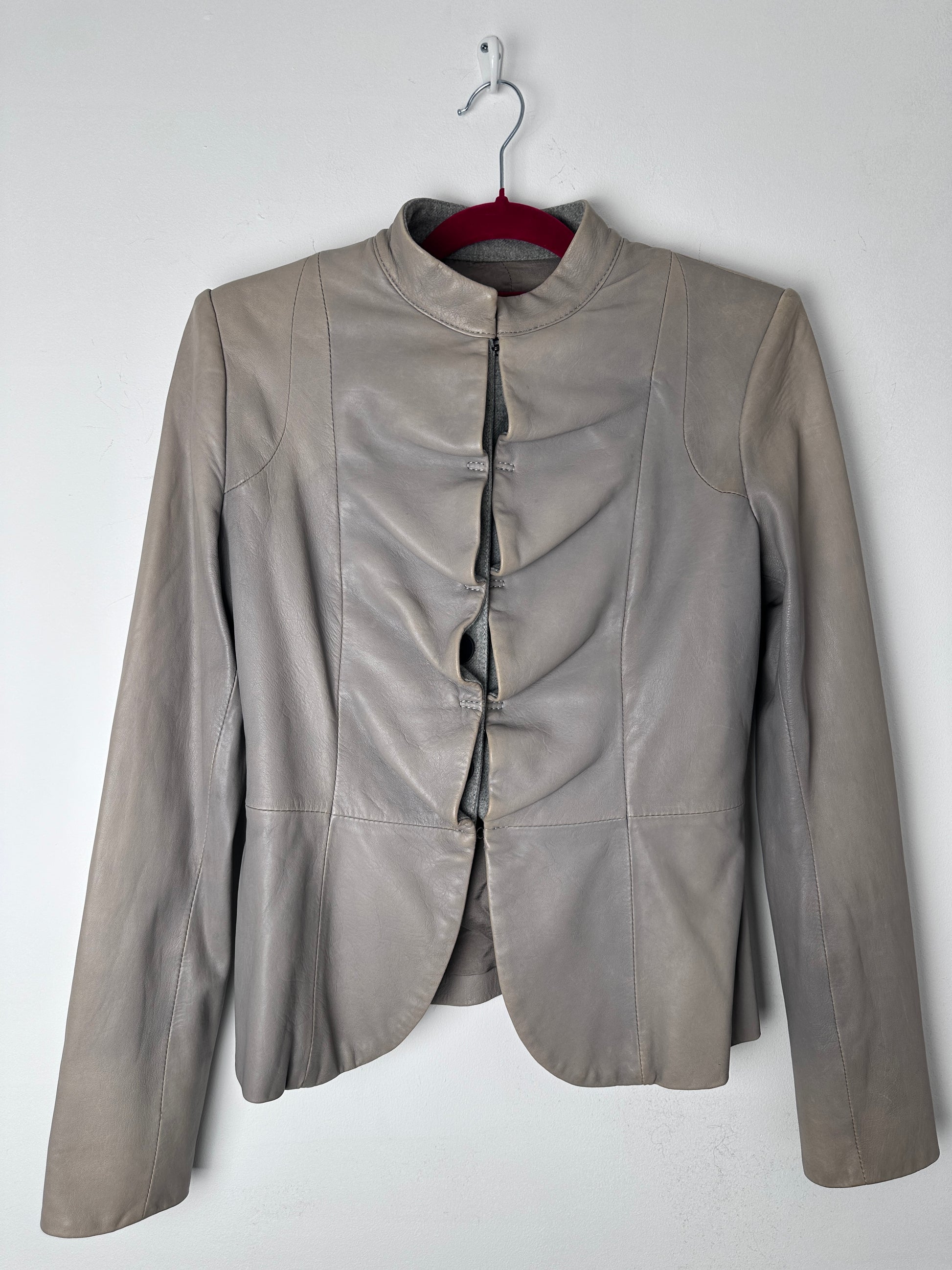 Gray leather jacket on a white background